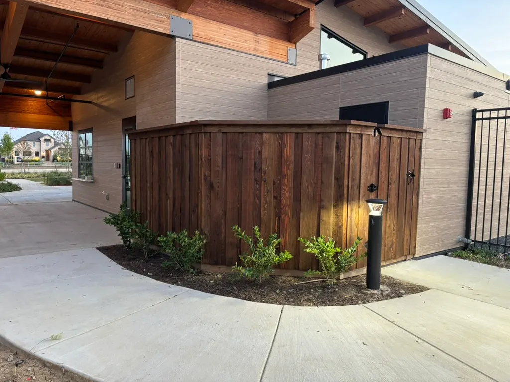 Pre-stained board-on-board cedar privacy fence built by Kodiak Fence Company
