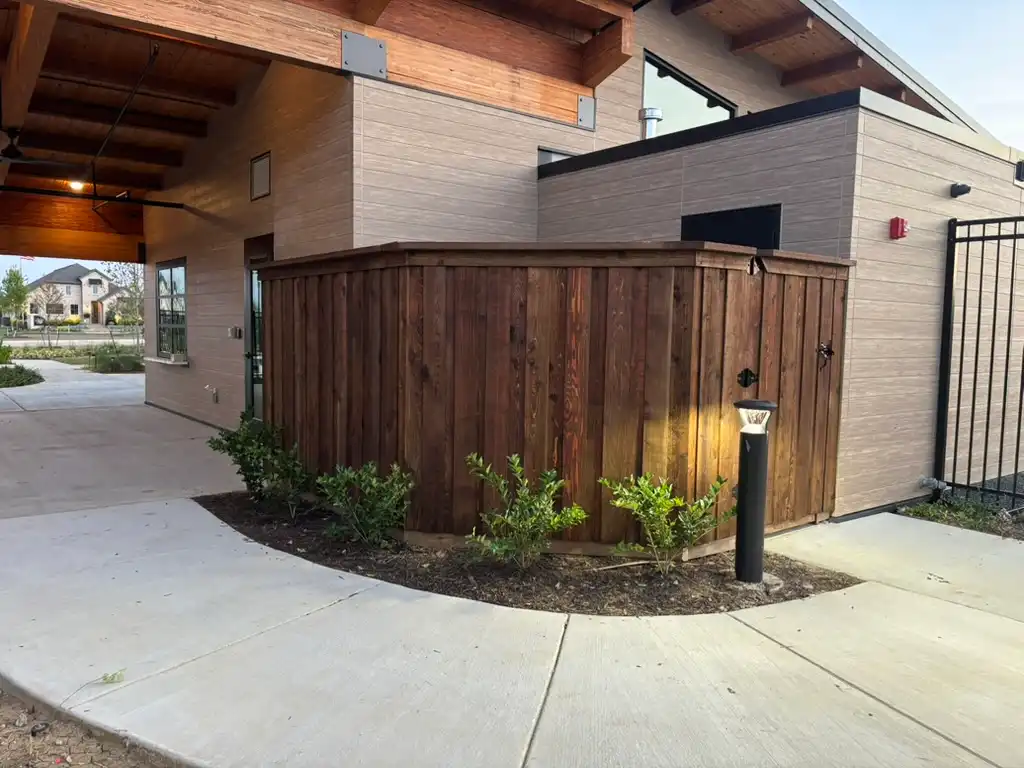 Pre-stained board-on-board wood fence