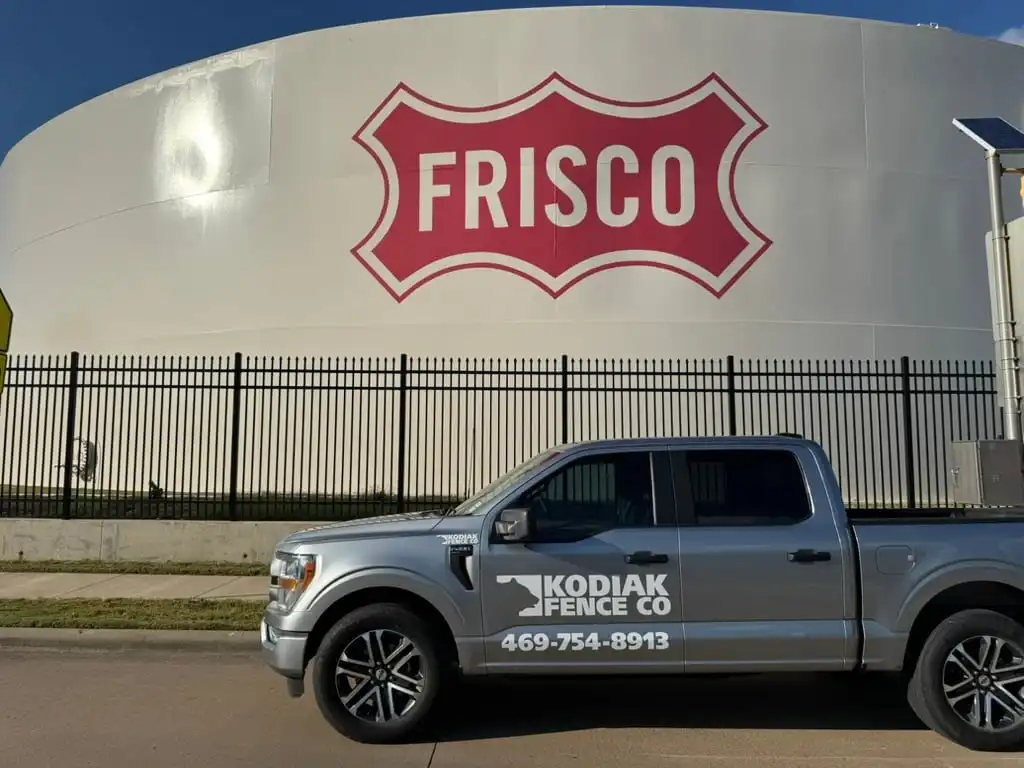 Kodiak Fence Company truck parked at the Frisco water tank