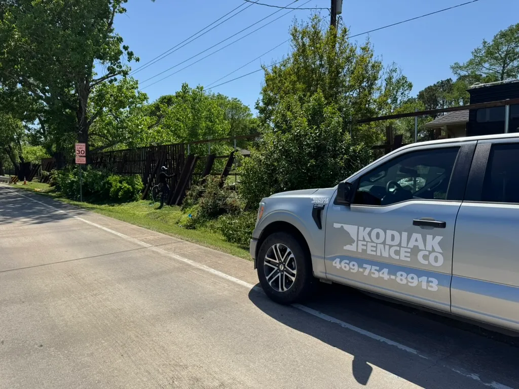 Kodiak Fence Company truck on an acreage jobsite