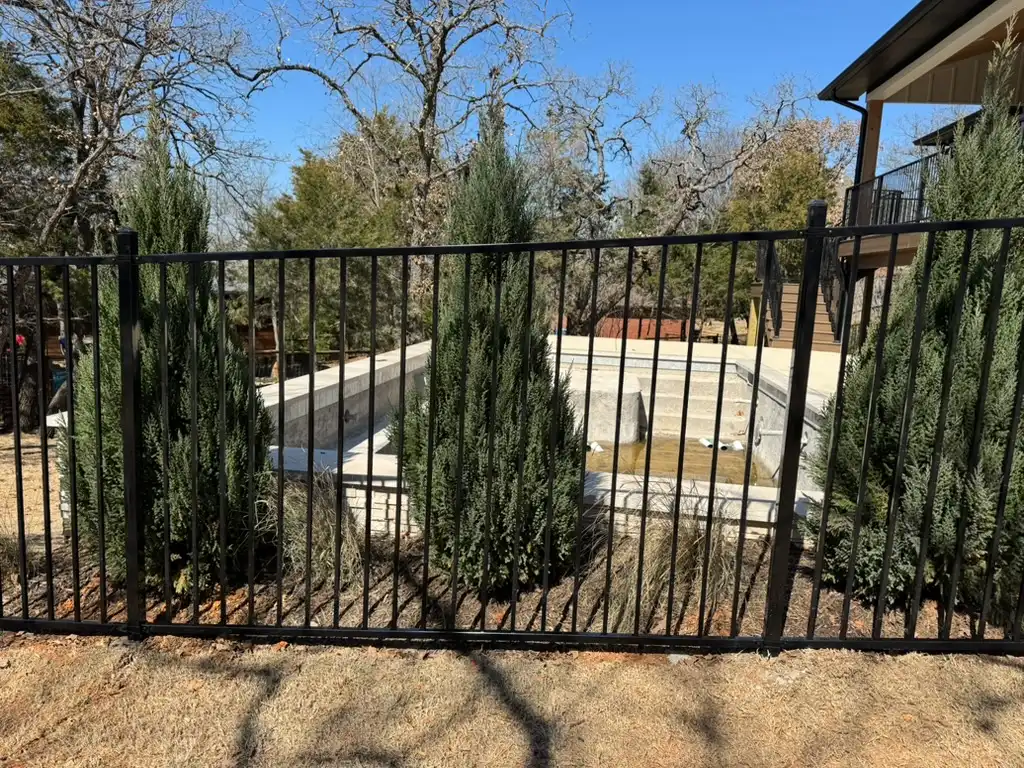 Ornamental steel estate fence built by Kodiak Fence Company