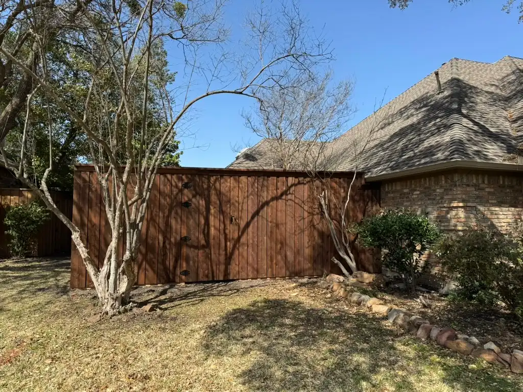 Cedar ranch-style fence with cap rail built by Kodiak Fence Company