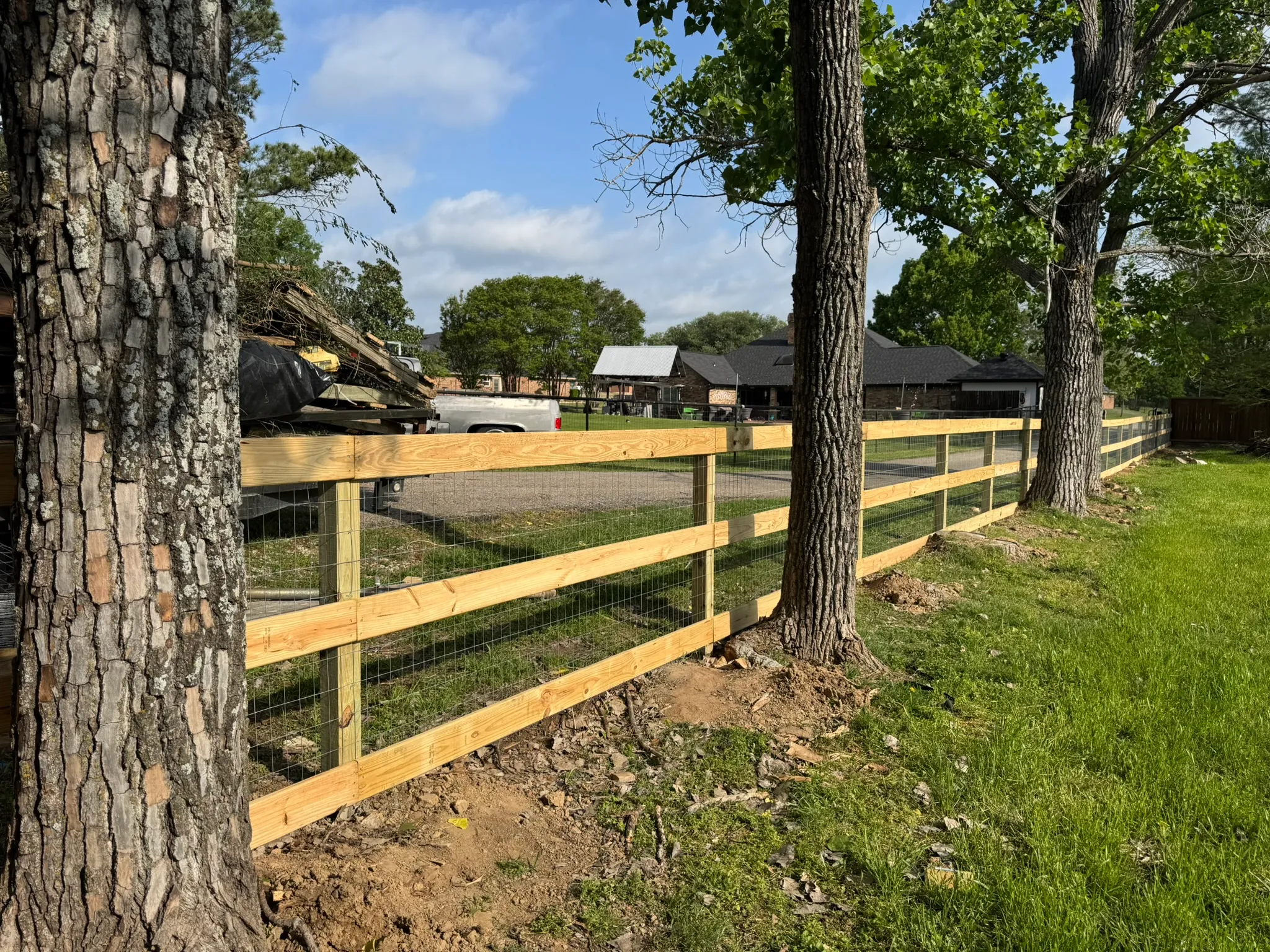 Rail fence with no-climb wire backing