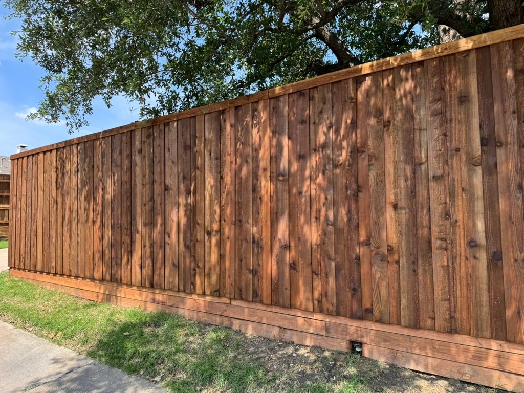 8-foot tall board-on-board privacy fence installation