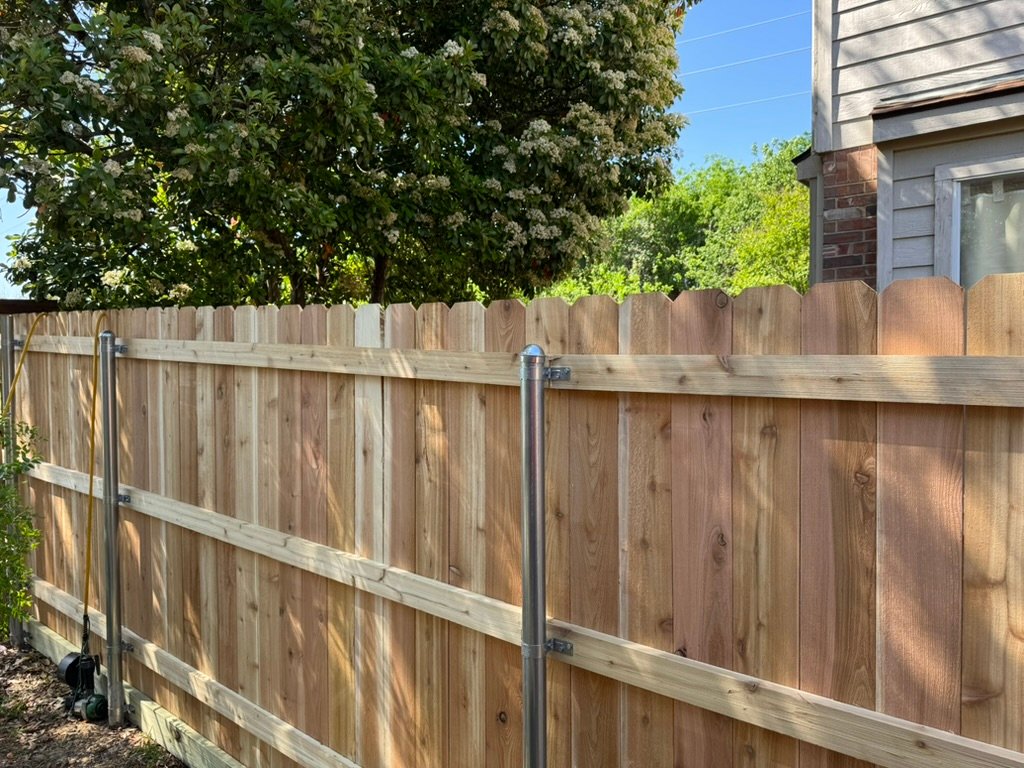 Cedar fence installation in Lewisville